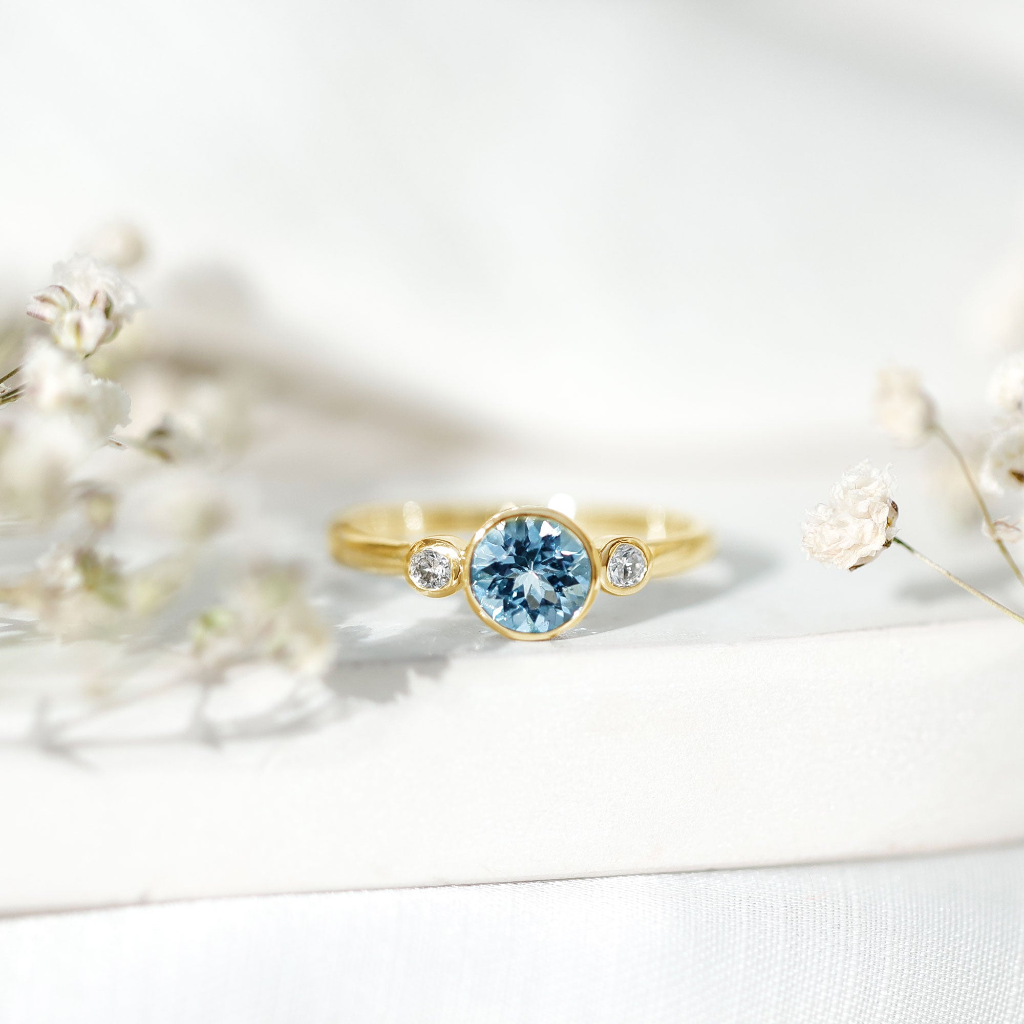 Bezel Set Aquamarine Solitaire Engagement Ring with Diamond